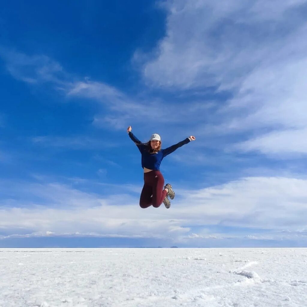 Stephanie jumping in the salt flats in Bolivia